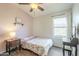 Charming bedroom with a double bed and wood floors at 2414 W Gambit Trl, Phoenix, AZ 85085