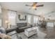 Open concept dining area with kitchen views and wood-look floors at 2414 W Gambit Trl, Phoenix, AZ 85085