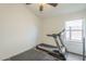 Small room with treadmill and wood-look floors at 2414 W Gambit Trl, Phoenix, AZ 85085