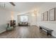 Bright living room with hardwood floors, and neutral color palette at 2414 W Gambit Trl, Phoenix, AZ 85085