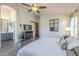 Main bedroom with ensuite bathroom and barn door at 2414 W Gambit Trl, Phoenix, AZ 85085