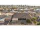 Aerial view of home showcasing backyard, covered patio, and mature trees at 26602 S Nicklaus Dr, Sun Lakes, AZ 85248