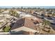 Aerial view of a single-Gathering home in a suburban neighborhood at 26602 S Nicklaus Dr, Sun Lakes, AZ 85248