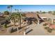 Single-story home with a two-car garage and desert landscaping at 26602 S Nicklaus Dr, Sun Lakes, AZ 85248