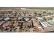 Aerial view showing home's location within a residential community at 26602 S Nicklaus Dr, Sun Lakes, AZ 85248