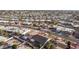 Aerial view of a residential neighborhood showing various homes and landscaping at 26602 S Nicklaus Dr, Sun Lakes, AZ 85248