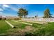 Well-maintained bocce ball court with green lawn at 26602 S Nicklaus Dr, Sun Lakes, AZ 85248