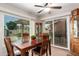 Dining area with sliding glass doors leading to backyard at 26602 S Nicklaus Dr, Sun Lakes, AZ 85248