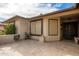 Front entrance with tiled patio and decorative door at 26602 S Nicklaus Dr, Sun Lakes, AZ 85248