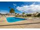 Community pool with spa and lounge chairs at 26602 S Nicklaus Dr, Sun Lakes, AZ 85248