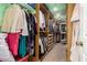 Spacious walk-in closet with ample shelving and storage at 26602 S Nicklaus Dr, Sun Lakes, AZ 85248