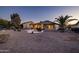 Landscaped backyard with gravel and desert plants at 27060 W Ross Ave, Buckeye, AZ 85396