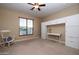 Bright bedroom featuring built-in cabinetry and a rocking chair at 27060 W Ross Ave, Buckeye, AZ 85396