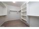 Spacious walk-in closet with ample shelving and hanging space at 27060 W Ross Ave, Buckeye, AZ 85396