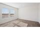 Bright and airy bedroom with plush carpeting and natural light at 2707 S 357Th Dr, Tonopah, AZ 85354