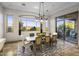 Dining area with sliding door access to the backyard and mountain views at 27627 N 168Th St, Rio Verde, AZ 85263