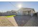 Artificial turf and brick paver backyard with covered patio at 2838 W Apollo Rd, Phoenix, AZ 85041