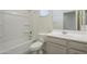 Clean bathroom with bathtub, toilet and vanity at 2838 W Apollo Rd, Phoenix, AZ 85041