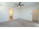 Main bedroom with carpet and en-suite bathroom at 2838 W Apollo Rd, Phoenix, AZ 85041