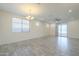 Bright dining room with tile floors and sliding glass door to patio at 2838 W Apollo Rd, Phoenix, AZ 85041