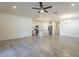 Open floor plan with kitchen, living, and dining areas at 2838 W Apollo Rd, Phoenix, AZ 85041