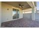 Covered patio with brick pavers and sliding glass door at 2838 W Apollo Rd, Phoenix, AZ 85041