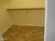 Walk-in closet with shelving and a hanging rod at 2845 W Angela N Dr, Phoenix, AZ 85053