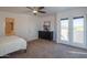 Comfortable bedroom with private access to balcony and ensuite bathroom at 30600 N Pima Rd # 33, Scottsdale, AZ 85266