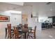 Elegant dining room features a sleek table and modern lighting at 30600 N Pima Rd # 33, Scottsdale, AZ 85266