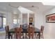 Bright dining room with a view and modern pendant lights at 30600 N Pima Rd # 33, Scottsdale, AZ 85266