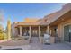 Outdoor patio area with built-in grill and access to the pool at 30600 N Pima Rd # 33, Scottsdale, AZ 85266