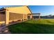 Covered patio with pergola and spacious grassy area at 30964 N Grace Ln, Queen Creek, AZ 85144