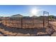 Round horse corral with metal fencing at 30964 N Grace Ln, Queen Creek, AZ 85144