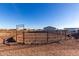 Sand-based horse corral with metal fencing at 30964 N Grace Ln, Queen Creek, AZ 85144