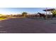 Open-air horse stables with a horse at 30964 N Grace Ln, Queen Creek, AZ 85144