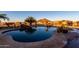 Stunning pool with a waterfall feature and mountain views at 30964 N Grace Ln, Queen Creek, AZ 85144