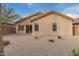 Spacious backyard with gravel and desert plants at 3257 W Five Mile Peak Dr, San Tan Valley, AZ 85144