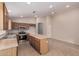 Kitchen with wood cabinets and tile floor at 3257 W Five Mile Peak Dr, San Tan Valley, AZ 85144