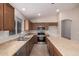 Modern kitchen with stainless steel appliances and light cabinetry at 3257 W Five Mile Peak Dr, San Tan Valley, AZ 85144