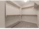 Large walk-in closet with ample shelving and hanging space at 3257 W Five Mile Peak Dr, San Tan Valley, AZ 85144