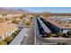 Aerial view showing building layout, parking and mountain views at 3270 S Goldfield Rd # 514, Apache Junction, AZ 85119