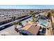 Aerial view of community with pool, parking and mountain views at 3270 S Goldfield Rd # 514, Apache Junction, AZ 85119