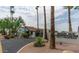 Desert Sun Condominiums, 3270 S. Goldfield, inviting entryway with lush landscaping at 3270 S Goldfield Rd # 514, Apache Junction, AZ 85119