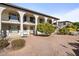 Exterior view of building showing balconies, landscaping and patio at 3270 S Goldfield Rd # 514, Apache Junction, AZ 85119