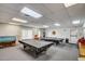 Well-lit game room with two billiard tables for residents' recreation at 3270 S Goldfield Rd # 514, Apache Junction, AZ 85119