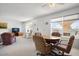 Bright living room with dining area, view, and comfy seating at 3270 S Goldfield Rd # 514, Apache Junction, AZ 85119