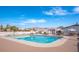 Relaxing community pool with surrounding patio at 3270 S Goldfield Rd # 514, Apache Junction, AZ 85119