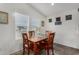 Bright dining area with wood table and chairs at 3301 S Goldfield Rd # 4065, Apache Junction, AZ 85119