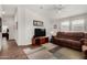 Living room with brown recliner chairs and view to bedroom at 3301 S Goldfield Rd # 4065, Apache Junction, AZ 85119