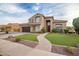 Two-story house with a landscaped lawn and walkway at 339 E Horseshoe Ave, Gilbert, AZ 85296